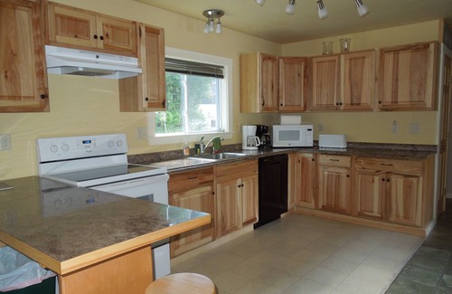 Peru House | Winter, Spring, Summer, or Fall this Worthley Pond Cottage has it all.