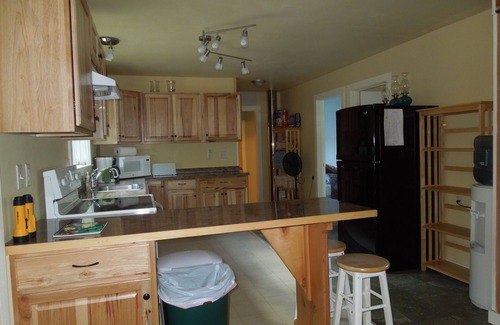 Peru House | Winter, Spring, Summer, or Fall this Worthley Pond Cottage has it all.