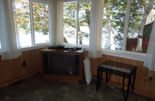 Peru House | Winter, Spring, Summer, or Fall this Worthley Pond Cottage has it all.