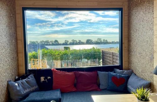 Elsfleth Apartment | WiNZiG Wohnen Tiny House SKADI am Weserstrand