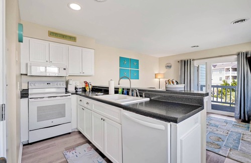 North Carolina Coast Condo | Wishing I was knee deep in the water somewhere!