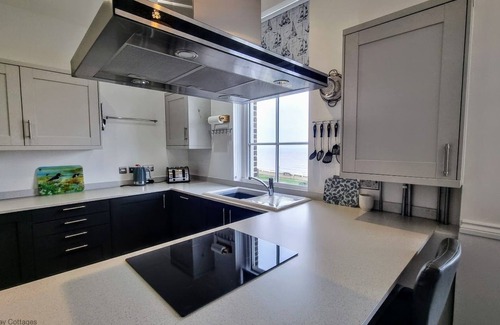 Sheringham Apartment | With its wonderful, far reaching sea views, this first floor apartment certainly does have the WOW f