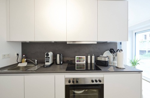 Holtensen Apartment | Wohnträumerei Design Apartment mit Netflix, kostenloses Wlan, Boxspringbett