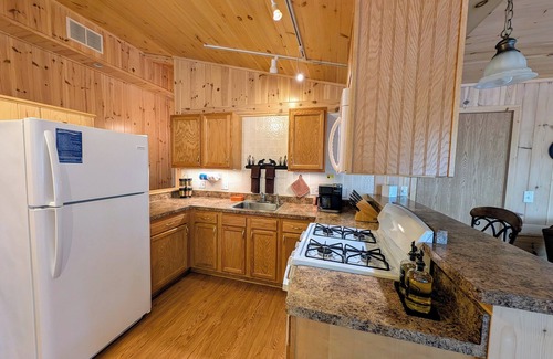 Sayner Cabin | Wolf Point Cabin at White Birch Lake | Firepit, Hammock, Lake Access, Dogs OK