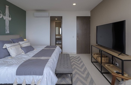 Colonia El Progreso Condo | Wonderful 3 bedroom condo with private garden and lovely views