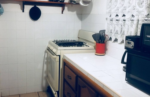 Las Gaviotas Condo | Wonderful bungalow in private tennis club located a block from Malecon and beach