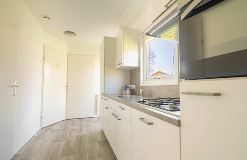 Biddinghuizen House | Wonderful private villa for 4 guests with WIFI, pool, TV, terrace and parking
