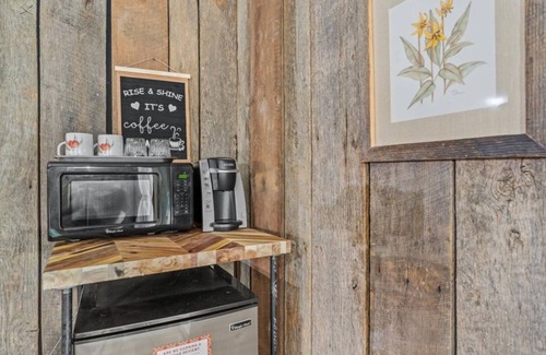 Townsend Hotel | Wood-Paneled Room | 4-Poster Bed | Smoky Mountain Stay