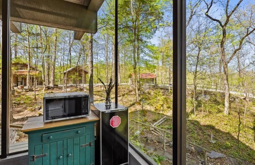 Townsend Hotel | Wood-Paneled Room | 4-Poster Bed | Smoky Mountain Stay