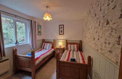 Burgh Island Ski Chalet | Woodcutters Lodge set in a secluded valley near Bantham