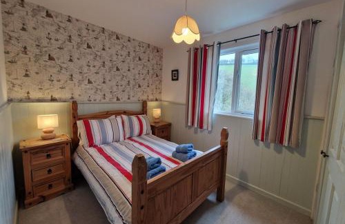 Burgh Island Ski Chalet | Woodcutters Lodge set in a secluded valley near Bantham