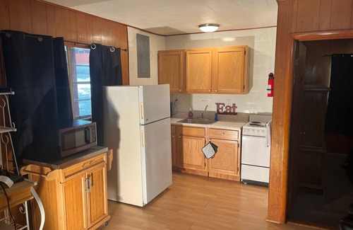 Mountain Home Cabin | Wooded Bliss Bungalow at Fish & Fiddle Family Resort & Extended Stay