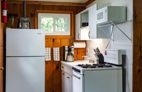 Gwinn Cottage | Wooded Lakeside Cottage ,Fishing, Snowmobiling, Hunting, Boats, Hot Tub