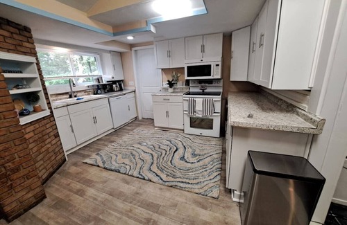 Oakwood Village House | Wooded Retreat with Game House