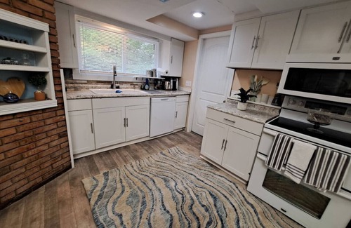 Oakwood Village House | Wooded Retreat with Game House