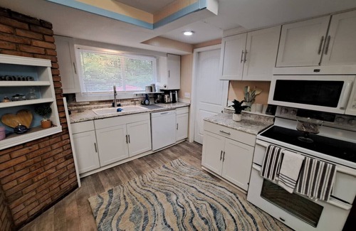 Oakwood Village House | Wooded Retreat with Game House
