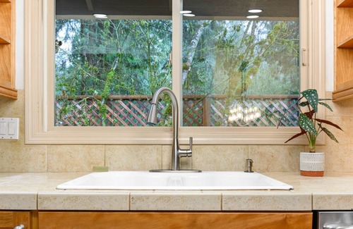 Marmot House | Wooded Riverside Retreat, Pet Friendly, Single Level, Open Layout, Hot Tub, BBQ, 20 Miles to Mt Hood