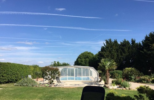 Chabournay Cabin | Wooden caravan on large estate with swimming pool - for 4 people