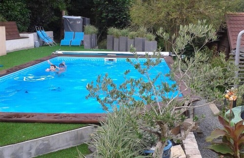 Les Lucs-sur-Boulogne Ski Chalet | Wooden cottage on the water