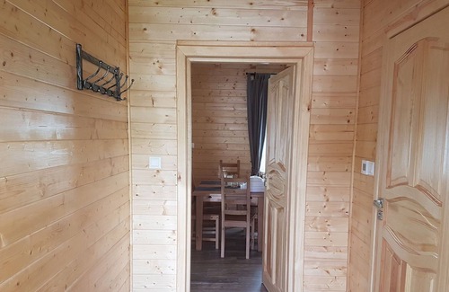 gmina Osiek House | Wooden Holiday Home in Skrzynia with Terrace