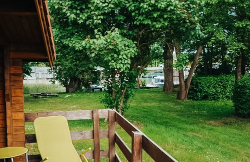Priepert House | Wooden house directly on the lake