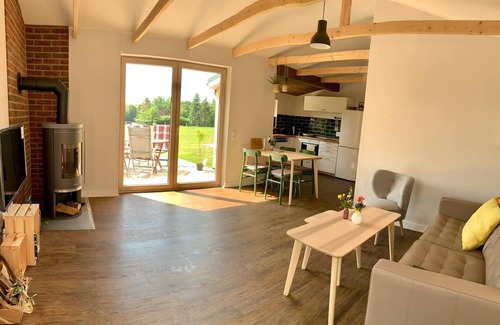 Am Dobrock House | Wooden house in the countryside with fireplace - Lytte Hytte | Holiday house Wingst