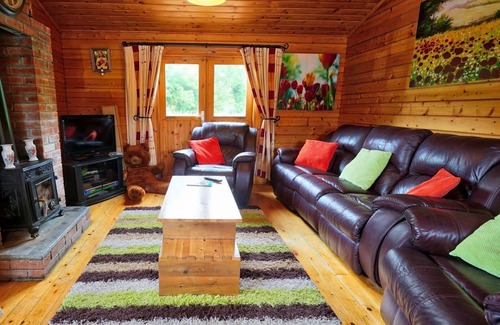 Clarinbridge House | Wooden log cabin entirely place