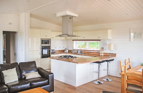 Woodham Walter Ski Chalet | Woodland Lodge that’s well equipped with one large double with en suite shower and one twin room.