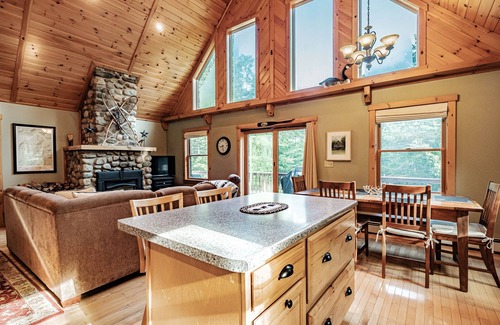 South Pond Shores Ski Chalet | Woodroad Chalet- Ski house close to water, Hot tub, large lot