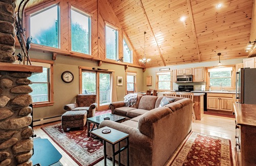 South Pond Shores Ski Chalet | Woodroad Chalet- Ski house close to water, Hot tub, large lot