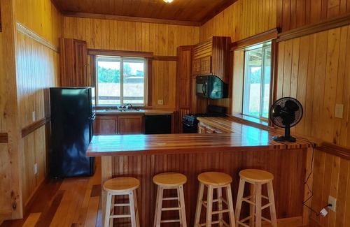 Gerry Cabin | Woodys Retreat this rental includes the barn outdoor covered fire pit