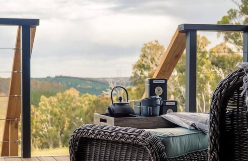 Kangaroo Gully Ski Chalet | Woora - Hills Kissed by Golden Sunrise as you awaken to a world kissed by dawn at Woora (Noongar for "far, far away").
