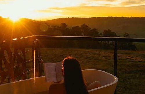 Kangaroo Gully Ski Chalet | Woora - Hills Kissed by Golden Sunrise as you awaken to a world kissed by dawn at Woora (Noongar for "far, far away").