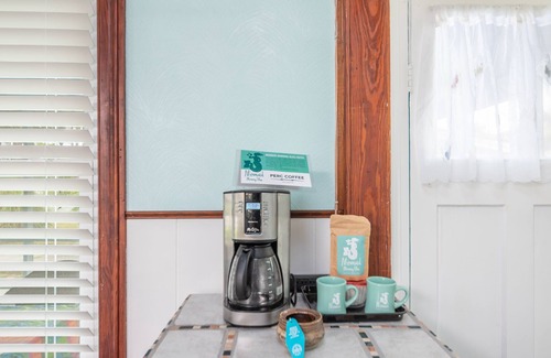 Savannah Beach Cottage | Wrap Around Screened Porch , Pet Friendly and Easy walk to Ocean & Beaches