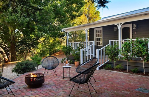 Daylesford House | Wrenwood Cottage 2 bedroom miners cottage with wood fire, 6 seater outdoor spa and 2 person indoor s
