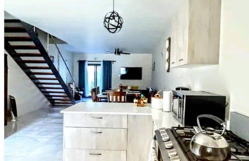 Discovery Bay House | Wynter'sEscape! 2BR w/pool & beach access near PuertoSeco Beach! w/24-hrsecurity