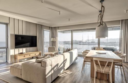 Srodmiescie Apartment | Yacht Park Marina by AmberBlue