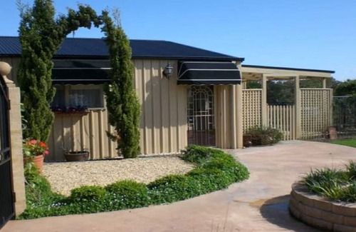 Bungwahl Cottage | Yarramin Park Farmstay - Pet Friendly, Couples Retreat. Fire pit.