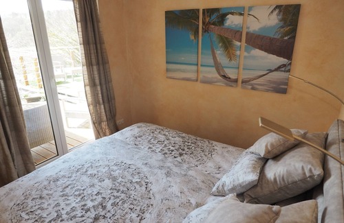 Konigheim Condo | Yellow house Mediterranean ambience Indoor pool Sauna Large outdoor terrace