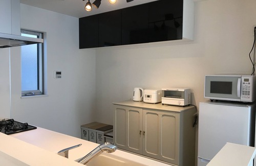 Katasekaigan House | You can relax in a spacious and relaxing atmosphere in a private building. Conveniently located near Enoshima Kamakura sightseeing. Two bicycles are available for rent free of charge. Local gourmet food, cafes, and the Enoshima illumination at night are a