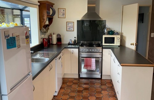 Te Anau House | You deserve the comfort, warmth & style of this clean family house.