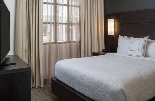 Arts/Warehouse District Hotel | You Found it! Contemporary 2BR Suite with Breakfast, Outdoor Pool, Pet-friendly!