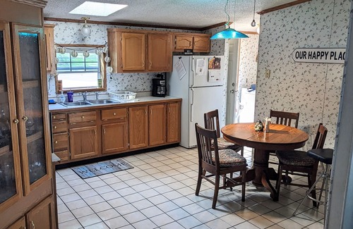 Coloma House | You'll love sipping a drink on the deck while enjoying views of Paw Paw Lake.