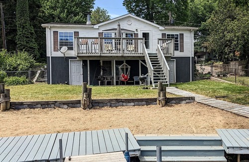 Coloma House | You'll love sipping a drink on the deck while enjoying views of Paw Paw Lake.