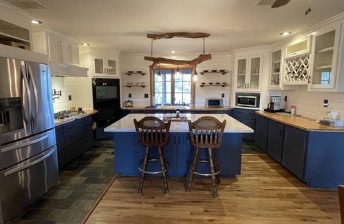 Brenham House | Your 12 Acre Farmhouse Retreat - Relax and Unwind by the Campfire and Pond