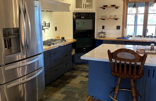 Brenham House | Your 12 Acre Farmhouse Retreat - Relax and Unwind by the Campfire and Pond