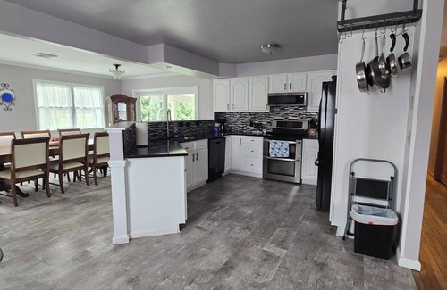 Conneaut Lake Apartment | Your Conneaut Lake Getaway: Comfy 3BR Duplex, Hot Tub, Fenced Yard!