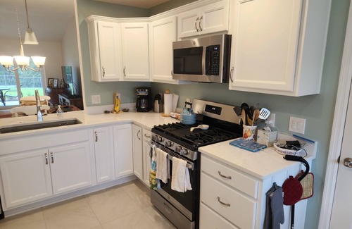Okahumpka House | Your Florida Luxury Escape! A new private retreat with preserve view & golf cart