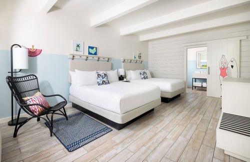 New Town Hotel | Your Island Base | 3 Pool View Rooms at Fun & Breezy Blue Flamingo Resort