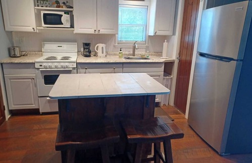 Winnisquam Cottage | Your Lakeside Getaway: Cozy Cottage, Dock, Endless Family Fun!
